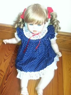 Large Porcelain Doll 23" Soft Body Feels Life Like Wears Baby Clothes
