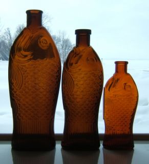 Vintage Fish Shaped Cod Liver Oil Amber Bottles by Fairmount Glass Works 1898