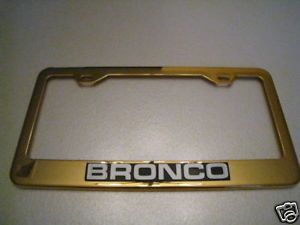 Ford Gold License Plate Frame White Bronco Logo Emblem