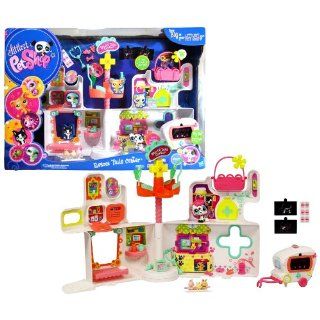 Hasbro Year 2009 Littlest Pet Shop Bobble Head Pet Figure Playset   RESCUE TAILS CENTER with Removable Cozy Swing Basket, Light Up Ambulance with "X Ray" Feature, 3 Newborn Bunnies on Stretcher and Dalmatian Pet Figure (#1613) Toys & Games
